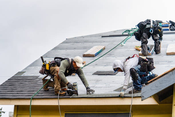 Professional Gutter Installation technician working in Clare, IL